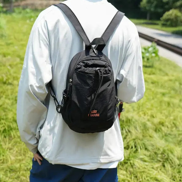 🎒Unisex Color Block Mini Backpack – Lightweight Water-Resistant Nylon Daypack