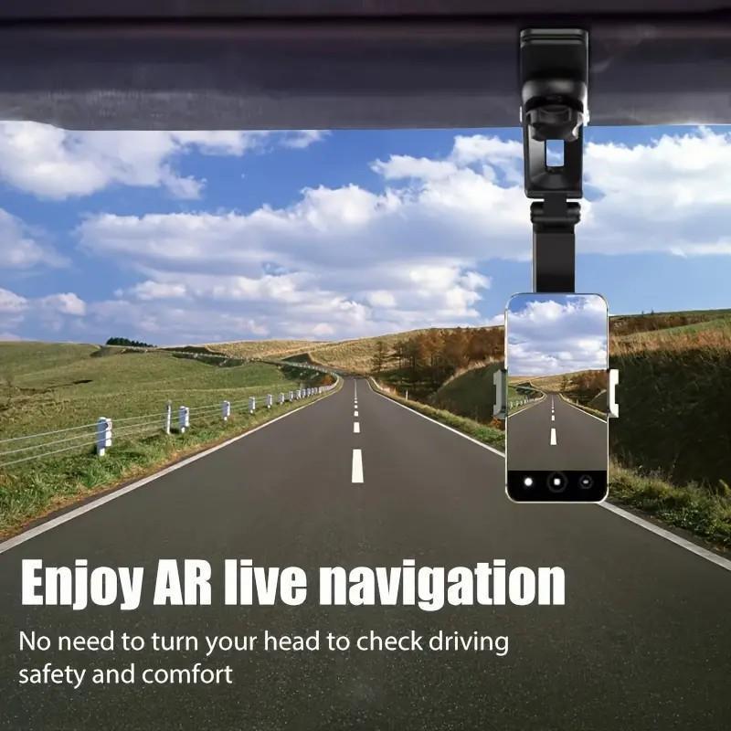 Smartphone displaying a navigation map in a car on an adjustable visor-mounted phone holder