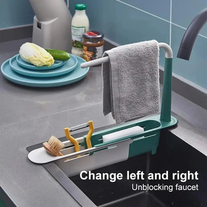 Sink organizer with elevated towel bar